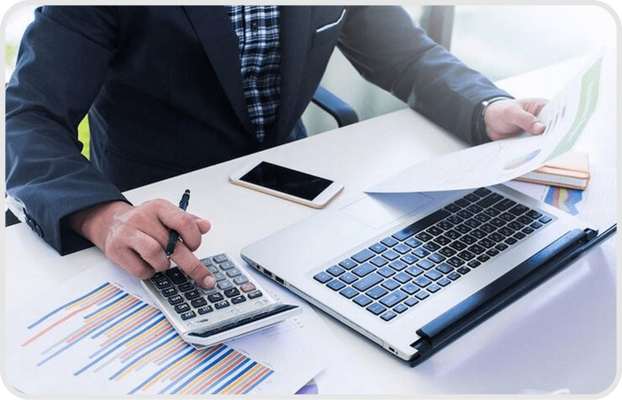 Accountant reviewing documents and financial records